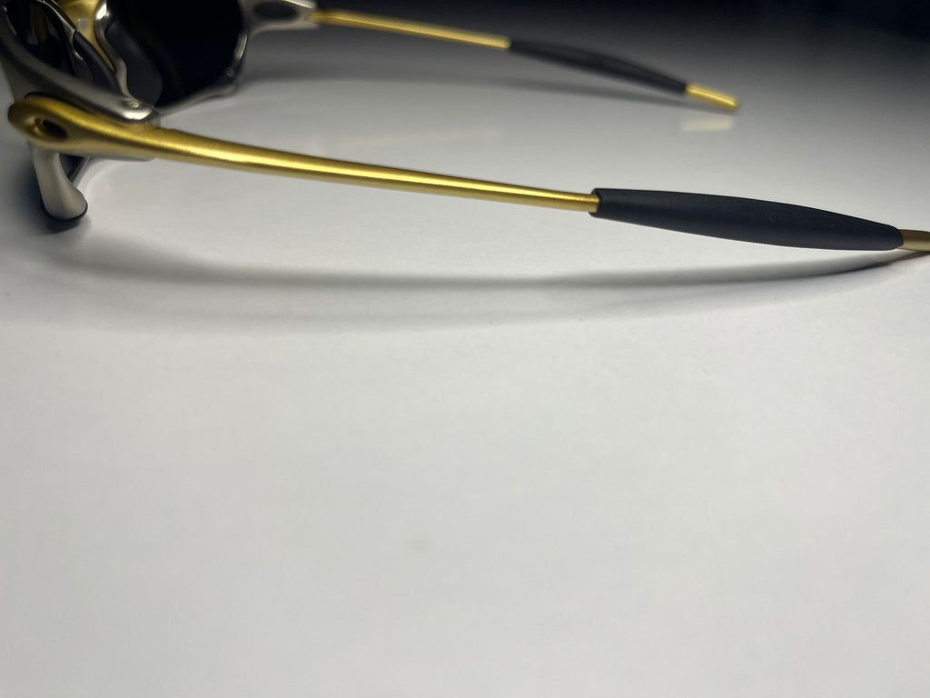 Resolute- Gold and Silver Frame - Ruby Lenses- Polarized