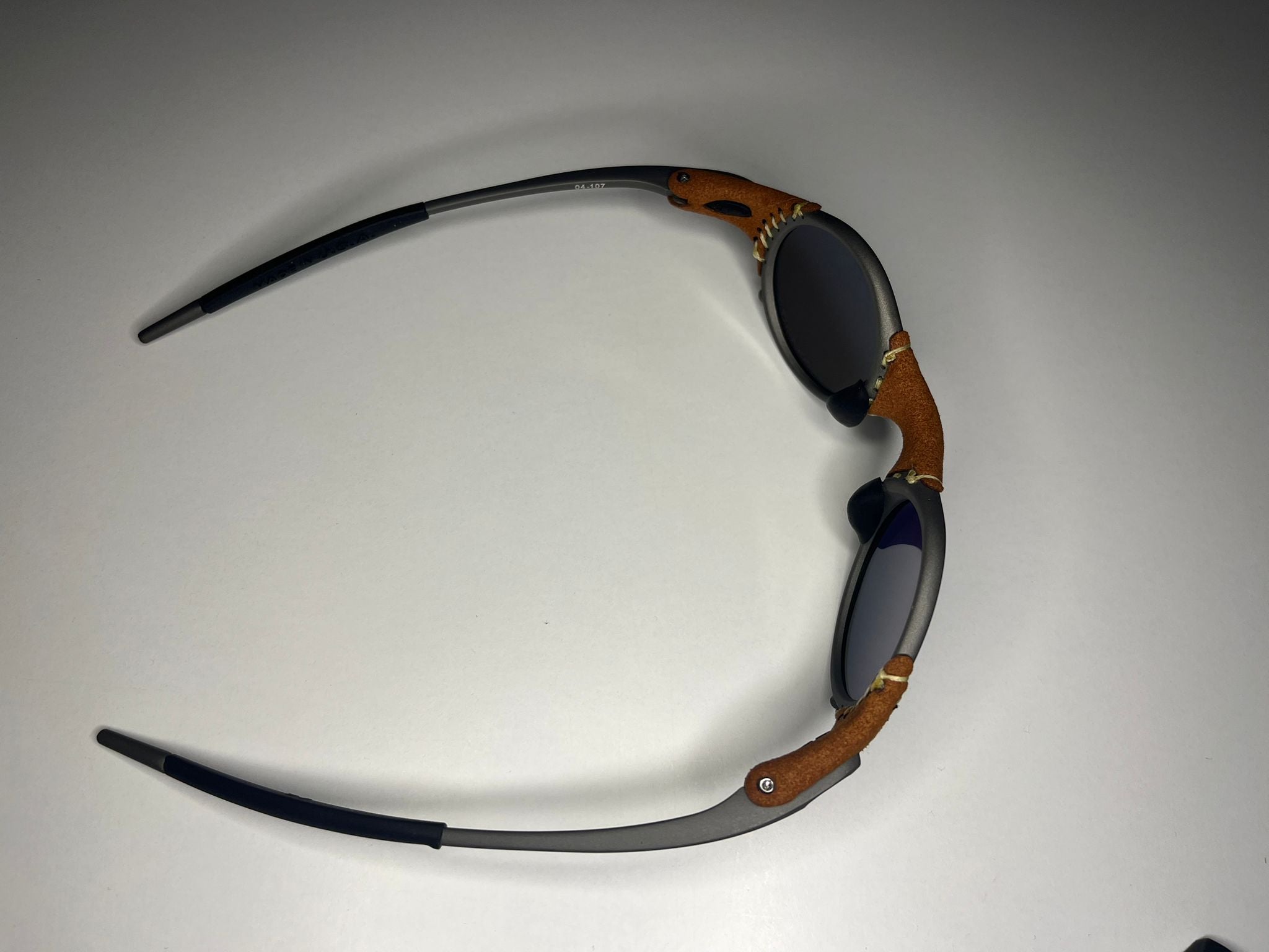 SteamPunk- Titanium/Leather Frame- Ruby Lenses- Polarized