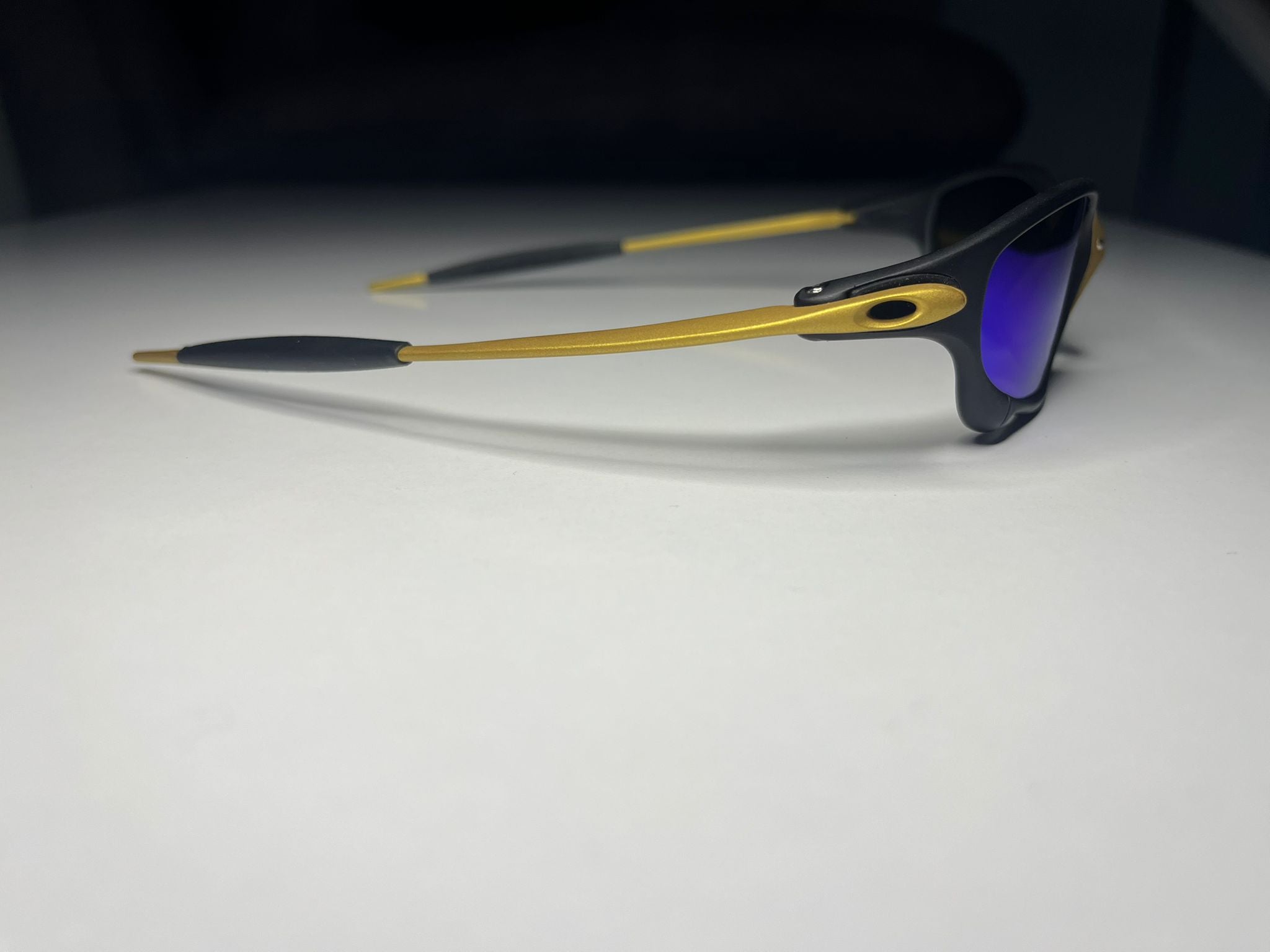 Resolute- Gold and Black Frame - Blue/Green Lenses- Polarized