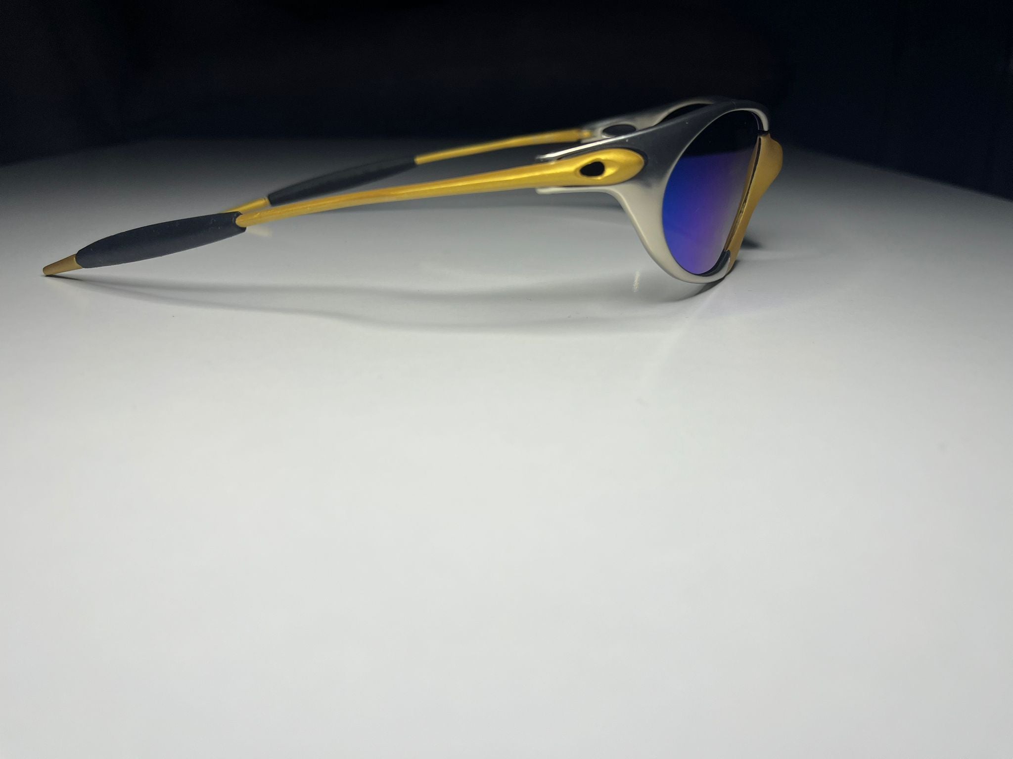 Predator- Silver and Gold Frames- Green Blue Lenses Polarized
