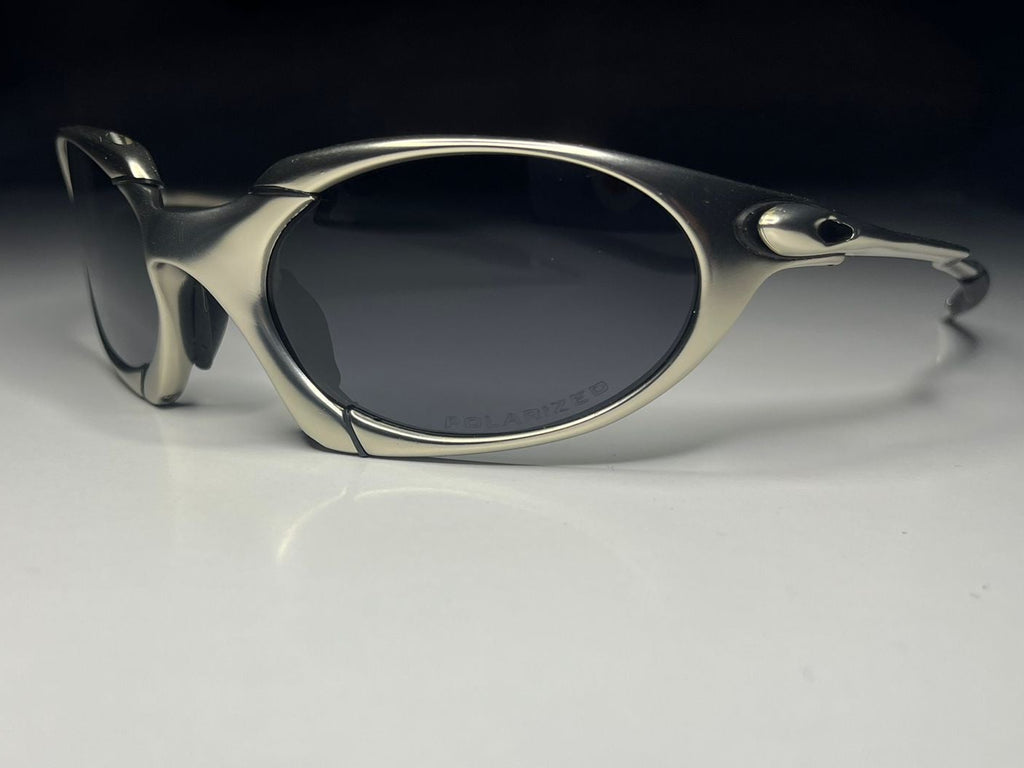 Sunglasses with a reflective surface on a white background
