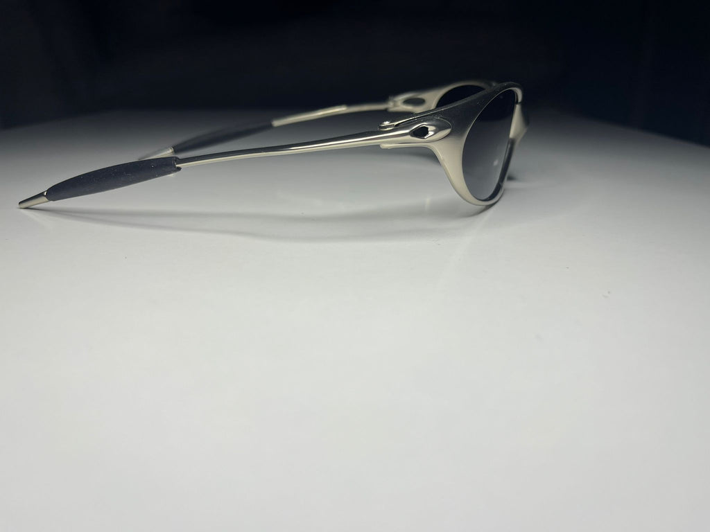 Predator- Polished Silver Frame- Black Iridium Lenses Polarized