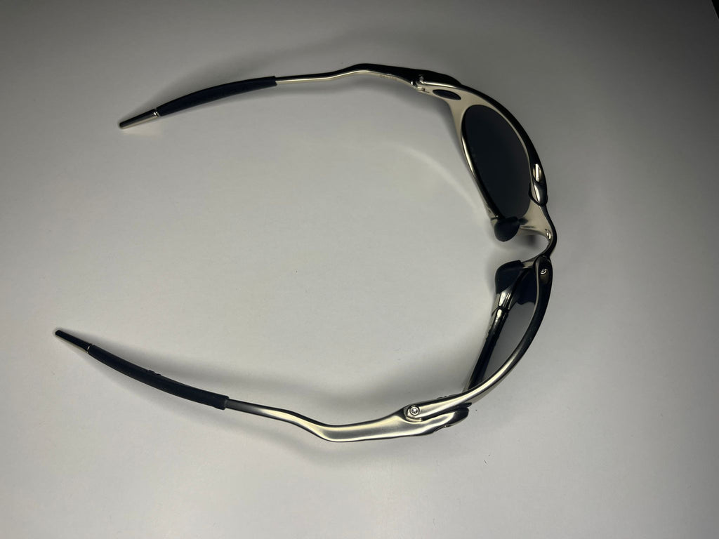 Predator- Polished Silver Frame- Black Iridium Lenses Polarized