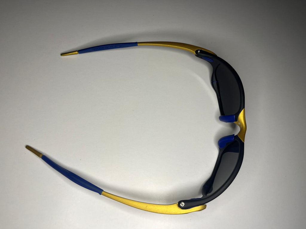 Resolute- 24K Gold and Black Frames- Metallic Blue Lenses Polarized