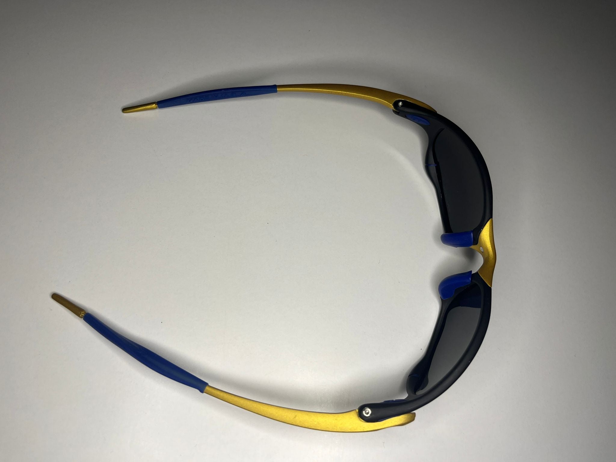 Resolute- 24K Gold and Black Frames- Metallic Blue Lenses Polarized