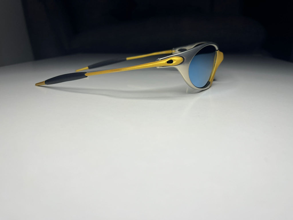 Predator- Gold and Silver Frames - Lite Blue Lenses Polarized