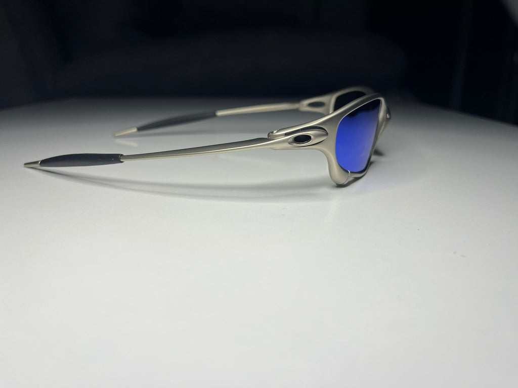 Resolute- Titanium Frame- Green/Blue Lenses- Polarized