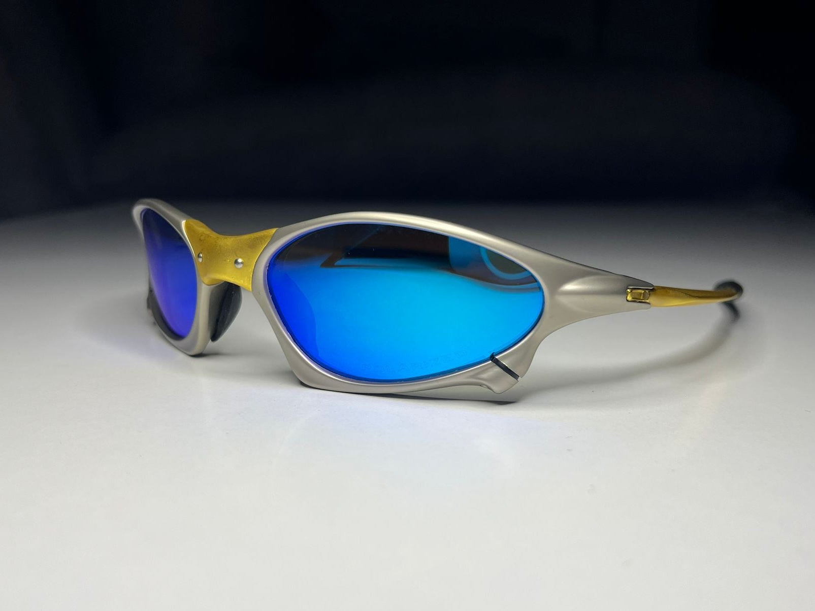 Axiom- 24K Gold and Plasma Frames- Metallic Blue Lenses- Polarized