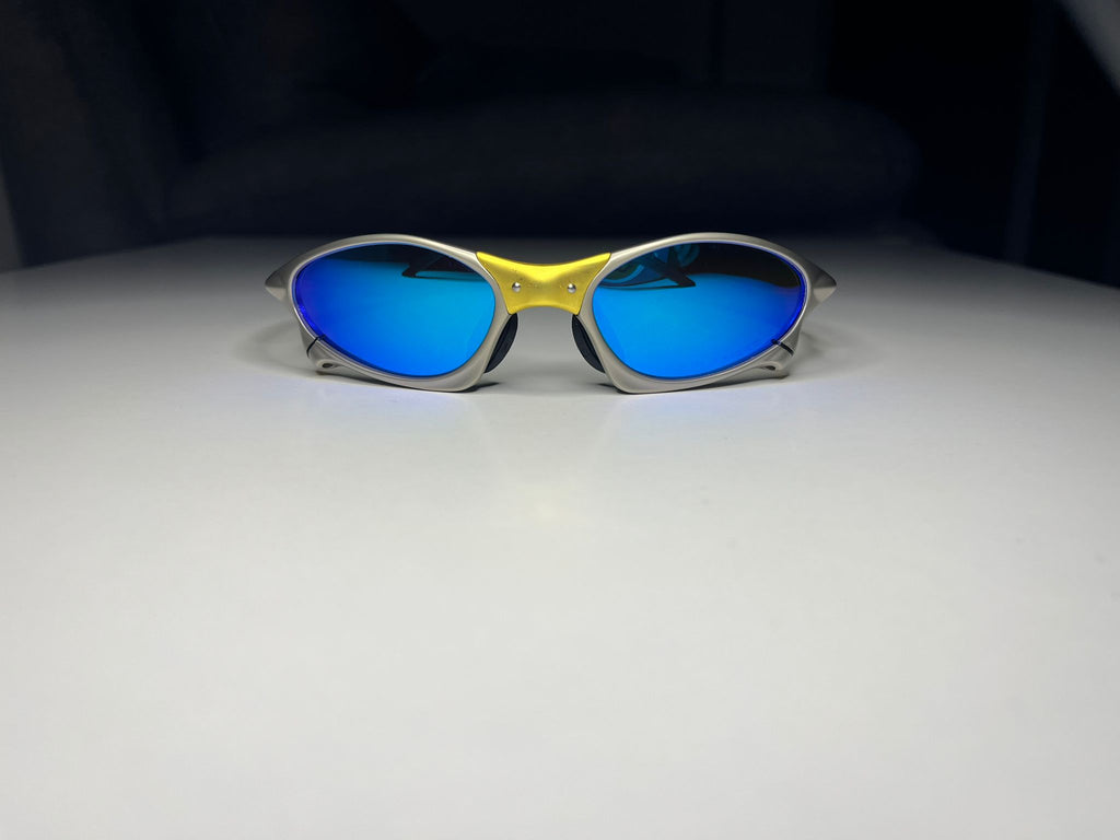 Axiom- 24K Gold and Plasma Frames- Metallic Blue Lenses- Polarized