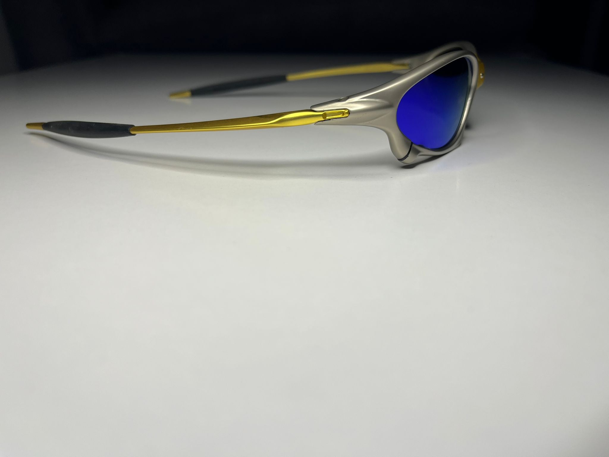 Axiom- Titanium/Gold Frame- Blue Lenses- Polarized