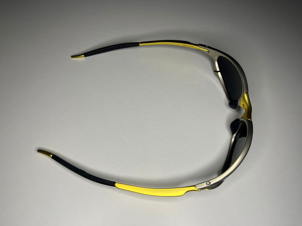 Axiom- Titanium/Gold Frame- Blue Lenses- Polarized