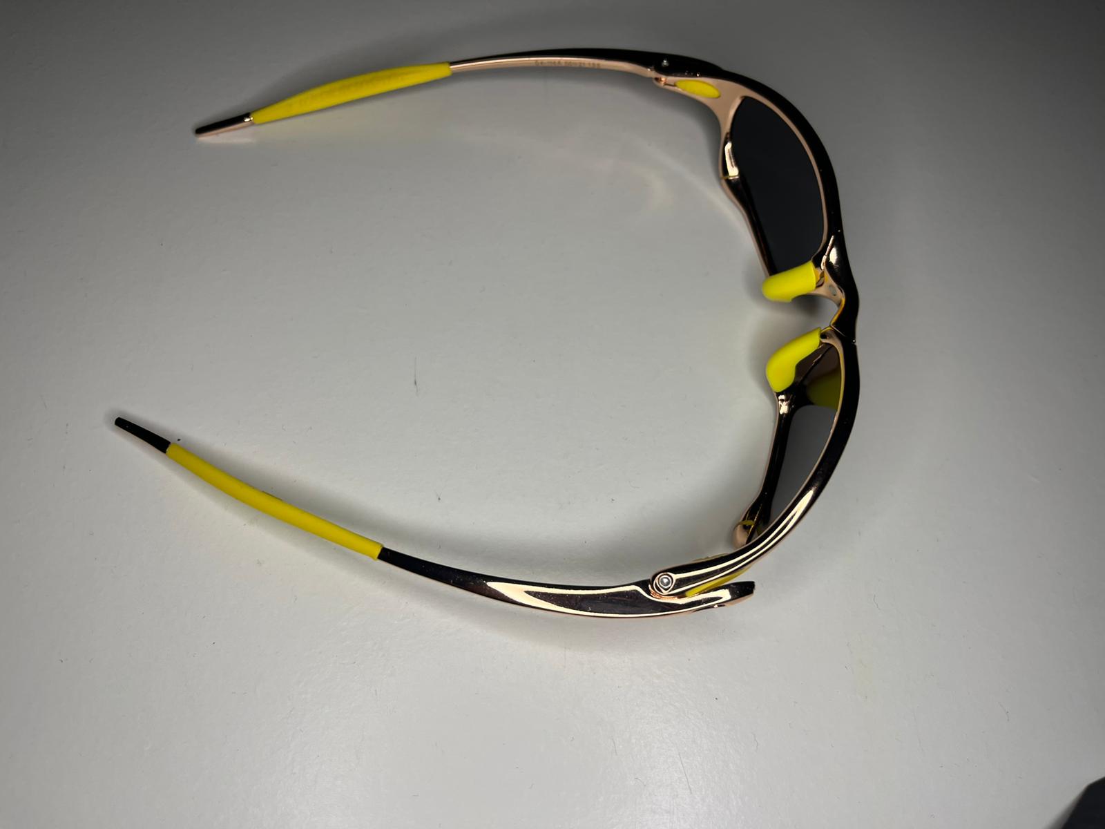 Resolute- Metallic Bronze Frames- Yellow Rubbers- Metallic Yellow Green Lenses- Polarized