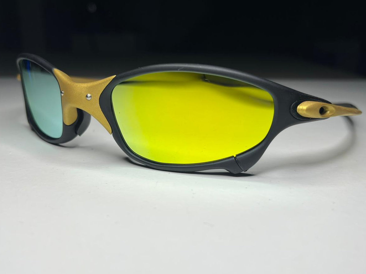 Sunglasses with yellow lenses and gold frame on a white background