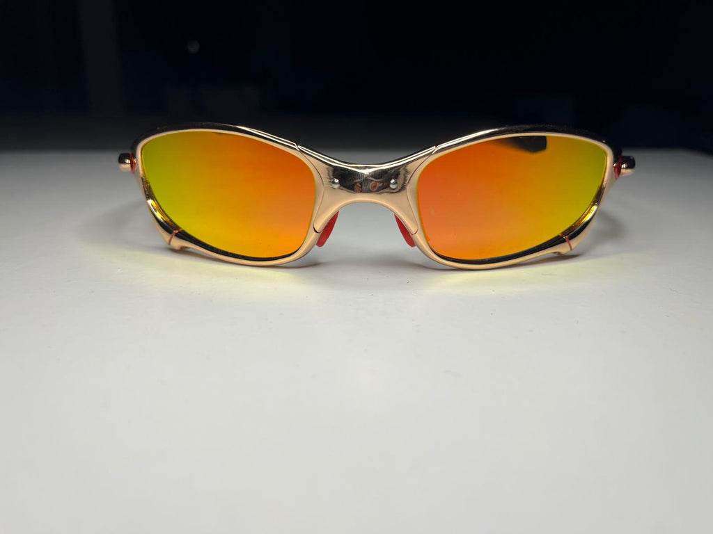 Resolute- Metallic Bronze Frames- Red Rubbers- Metallic Orange Lenses- Polarized
