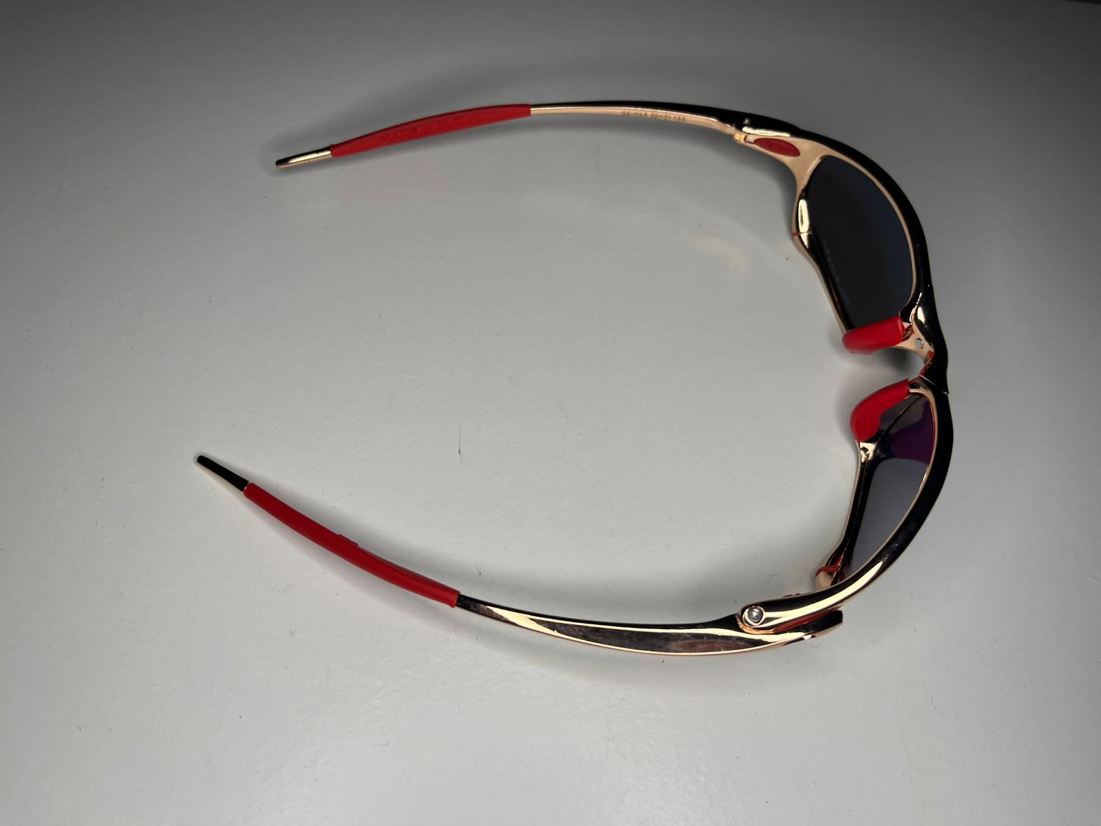 Resolute- Metallic Bronze Frames- Red Rubbers- Metallic Orange Lenses- Polarized